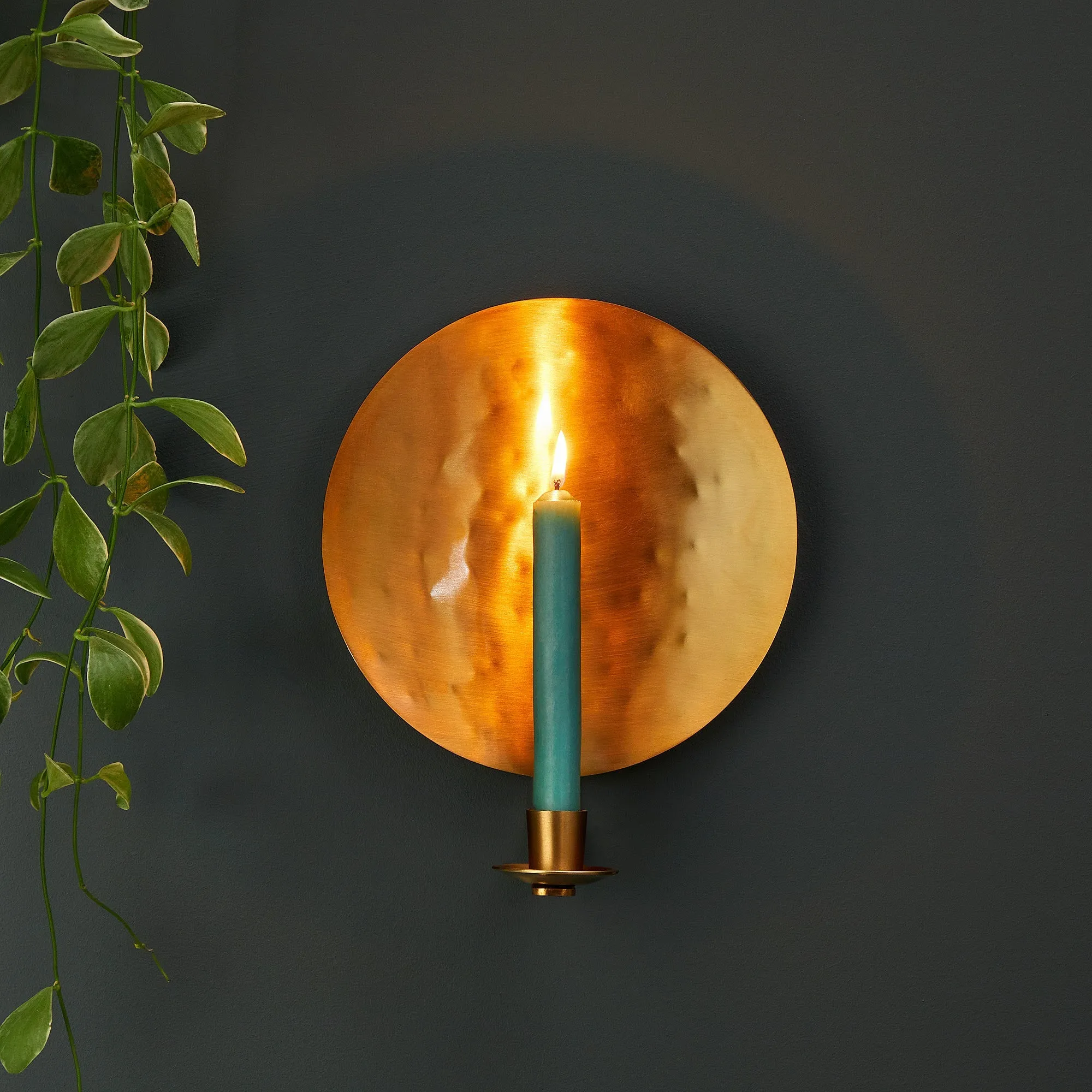 Celeste wall mounted candle holder in antique brass