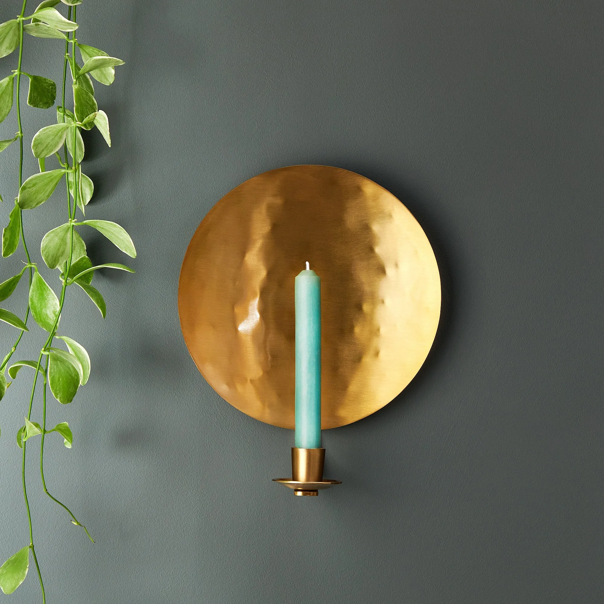 Celeste wall mounted candle holder in antique brass