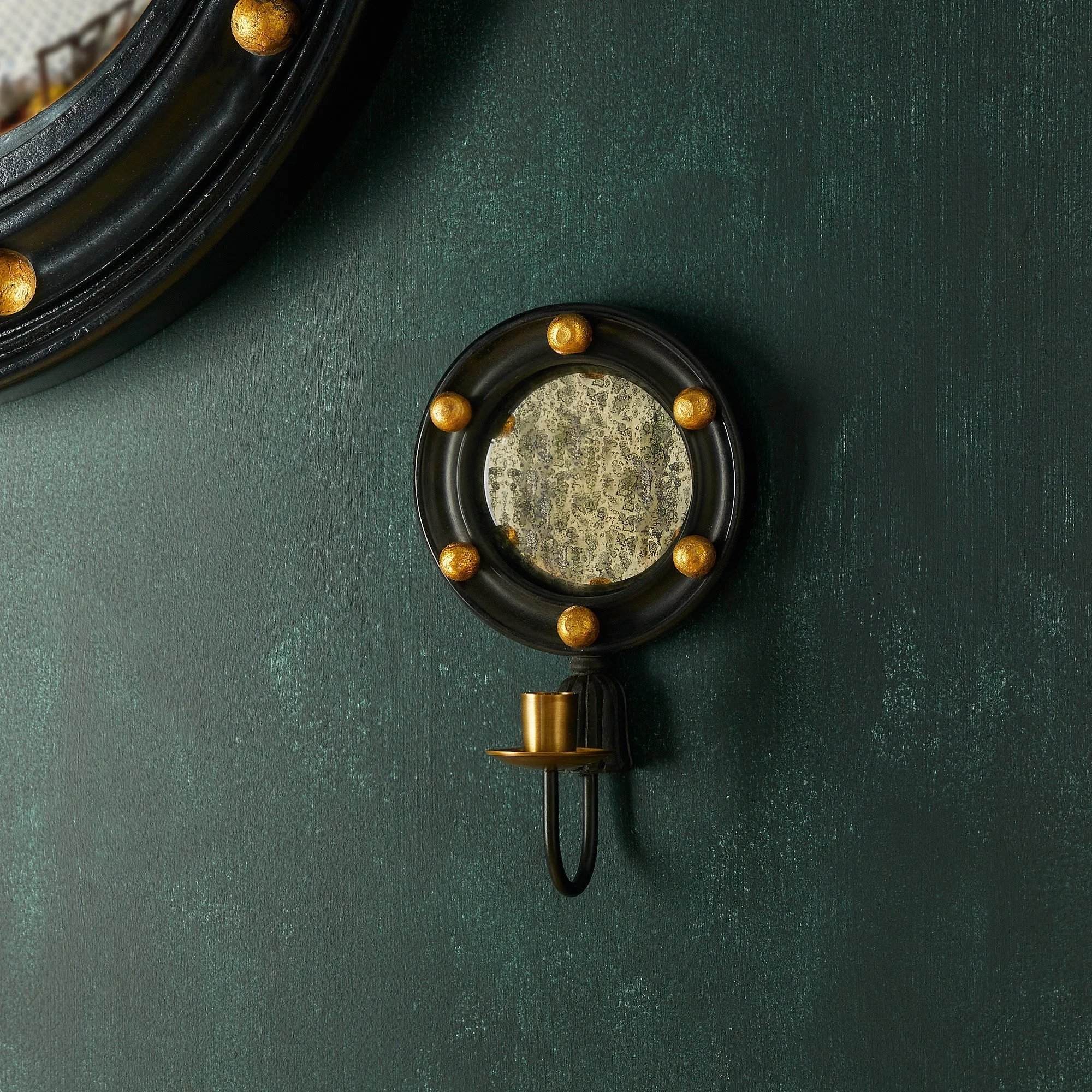 Dracool wall mounted candle holder in Ebony wood