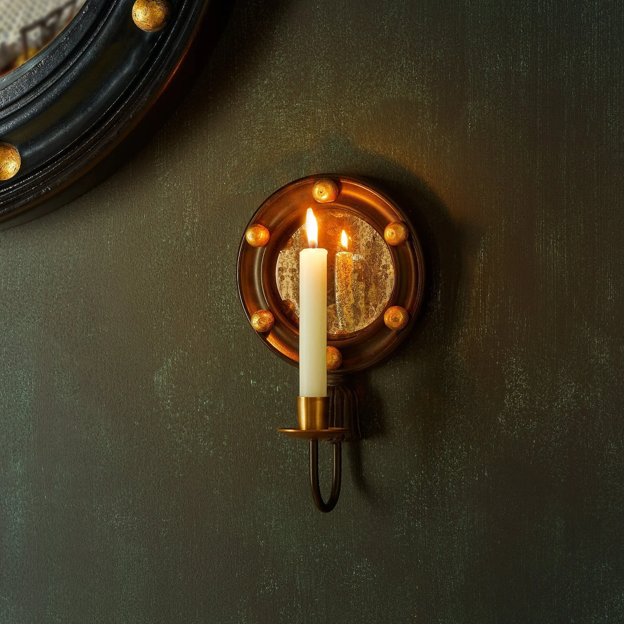 Dracool wall mounted candle holder in Ebony wood