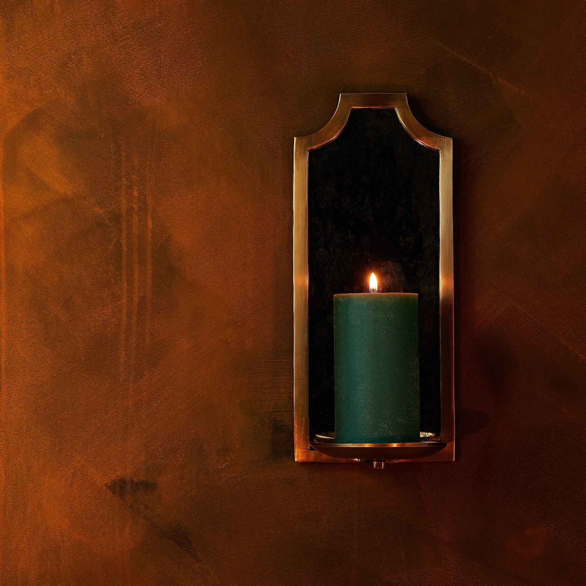 Kite wall mounted candle holder in antiqued brass