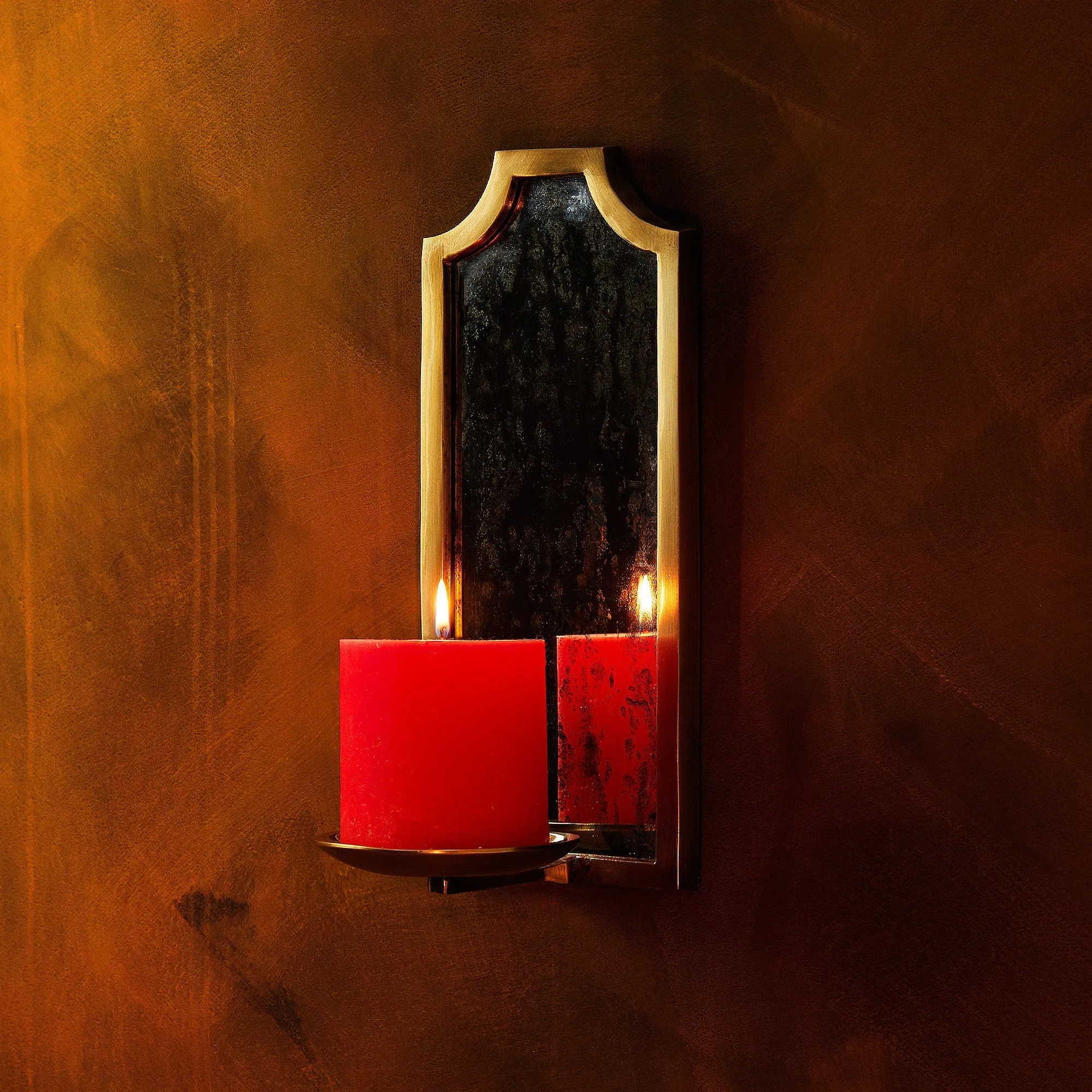 Kite wall mounted candle holder in antiqued brass