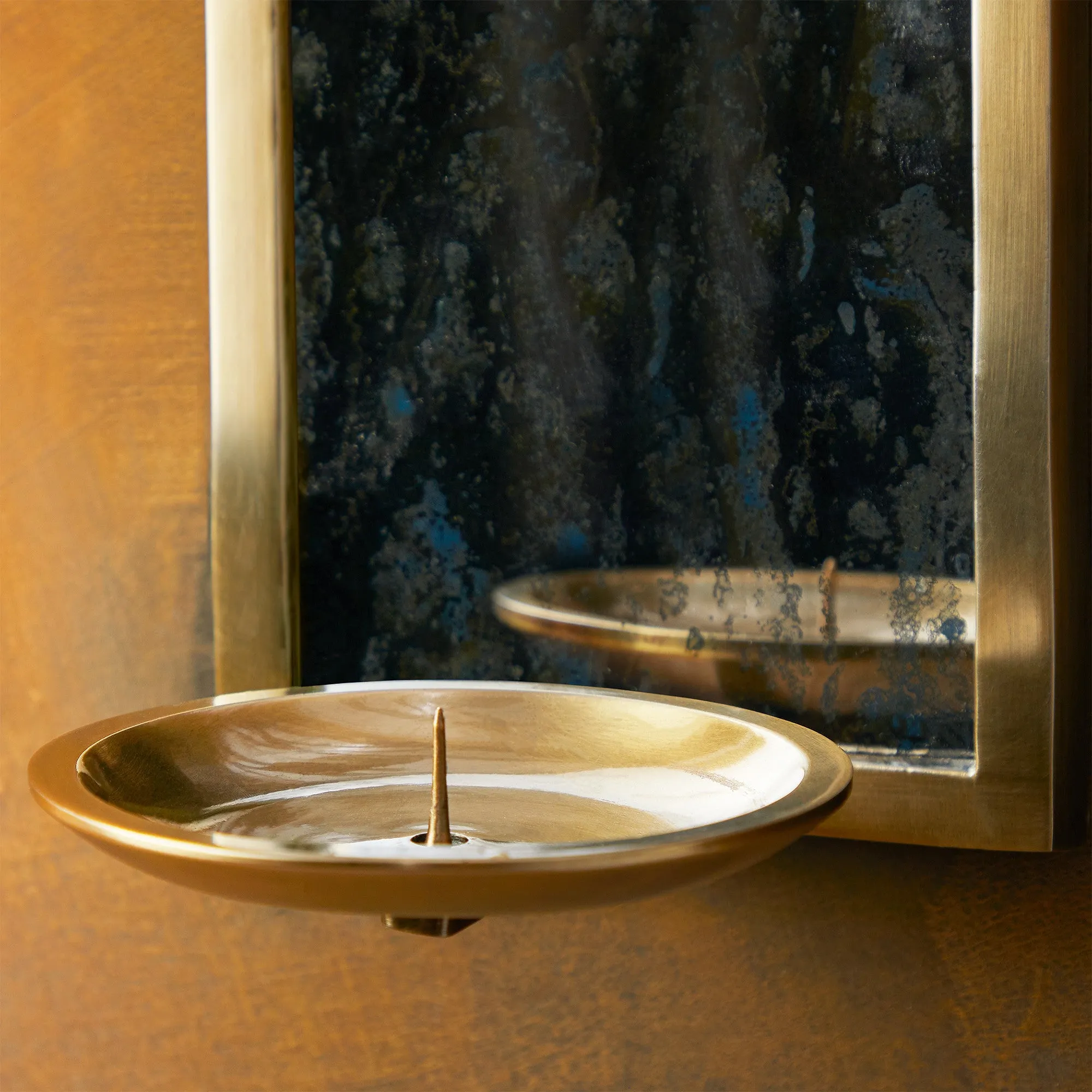 Kite wall mounted candle holder in antiqued brass