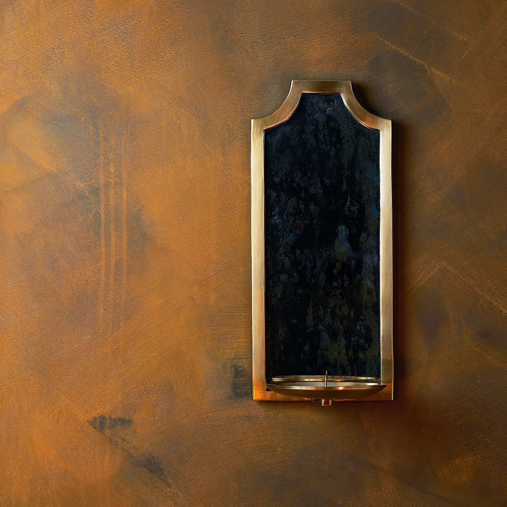 Kite wall mounted candle holder in antiqued brass