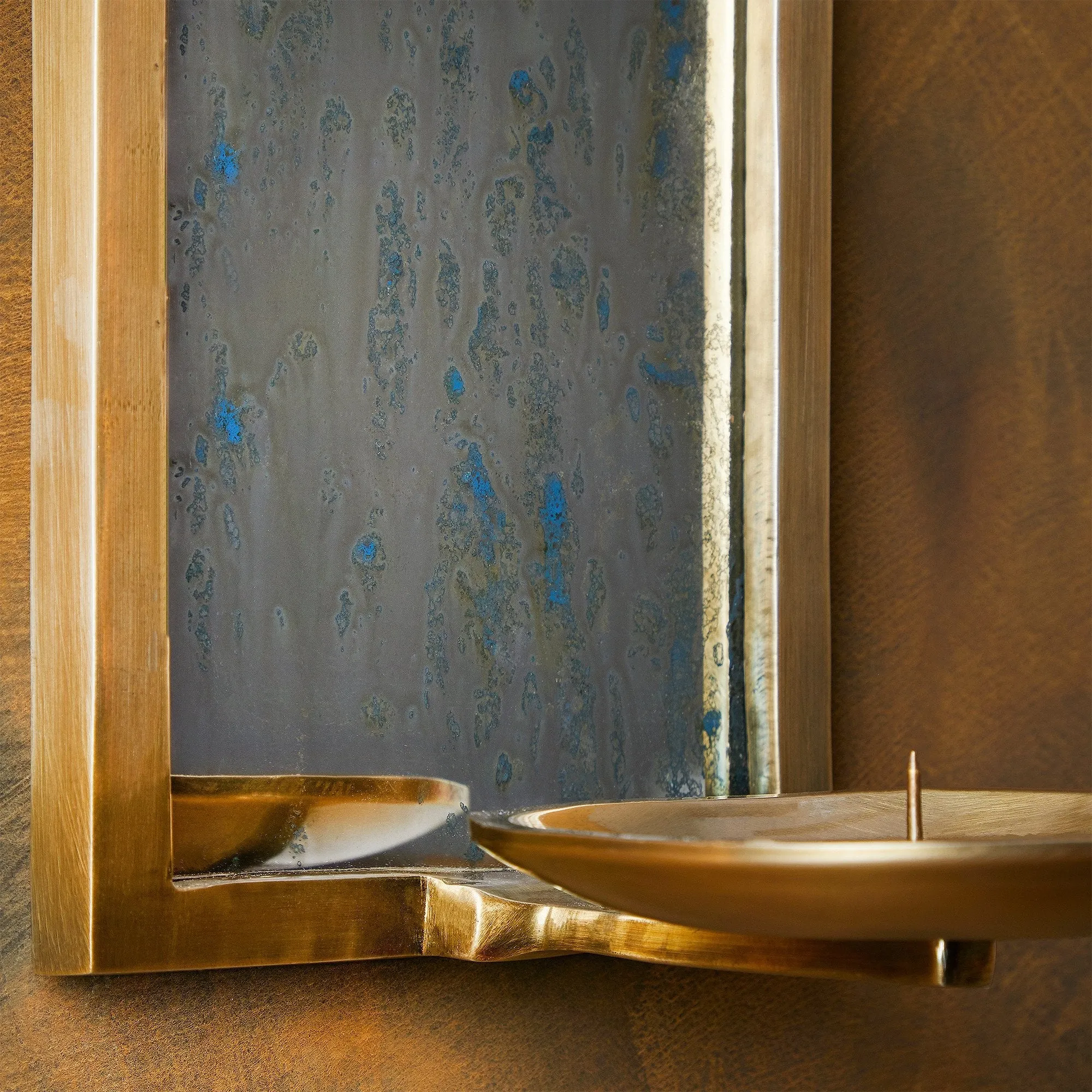Kite wall mounted candle holder in antiqued brass
