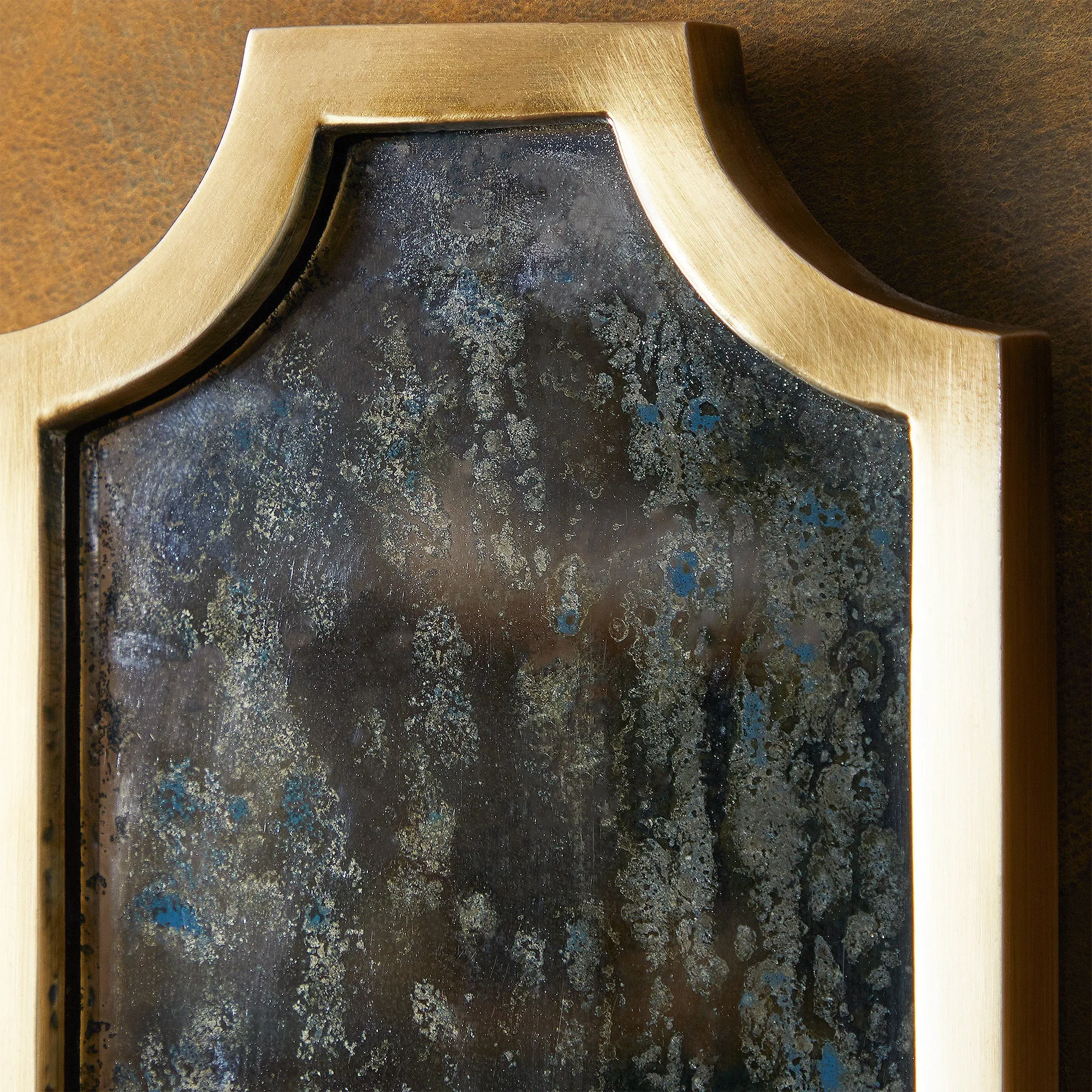 Kite wall mounted candle holder in antiqued brass
